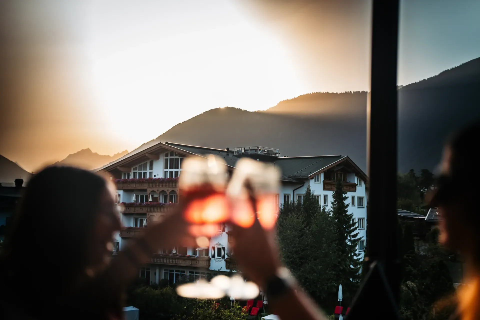 Celebrating at sunset on the Greenvieh rooftop terrace with mountain views in Mieming