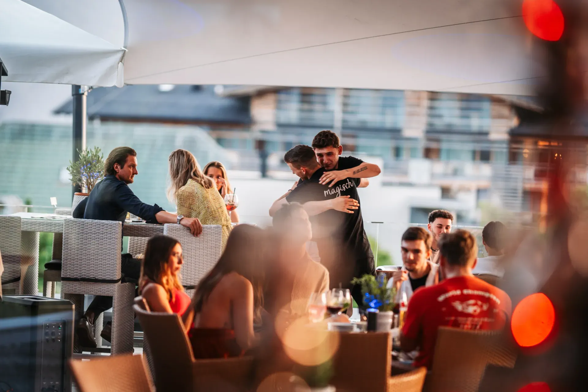 Evening sunset lounge atmosphere on the Greenvieh rooftop terrace in Tyrol