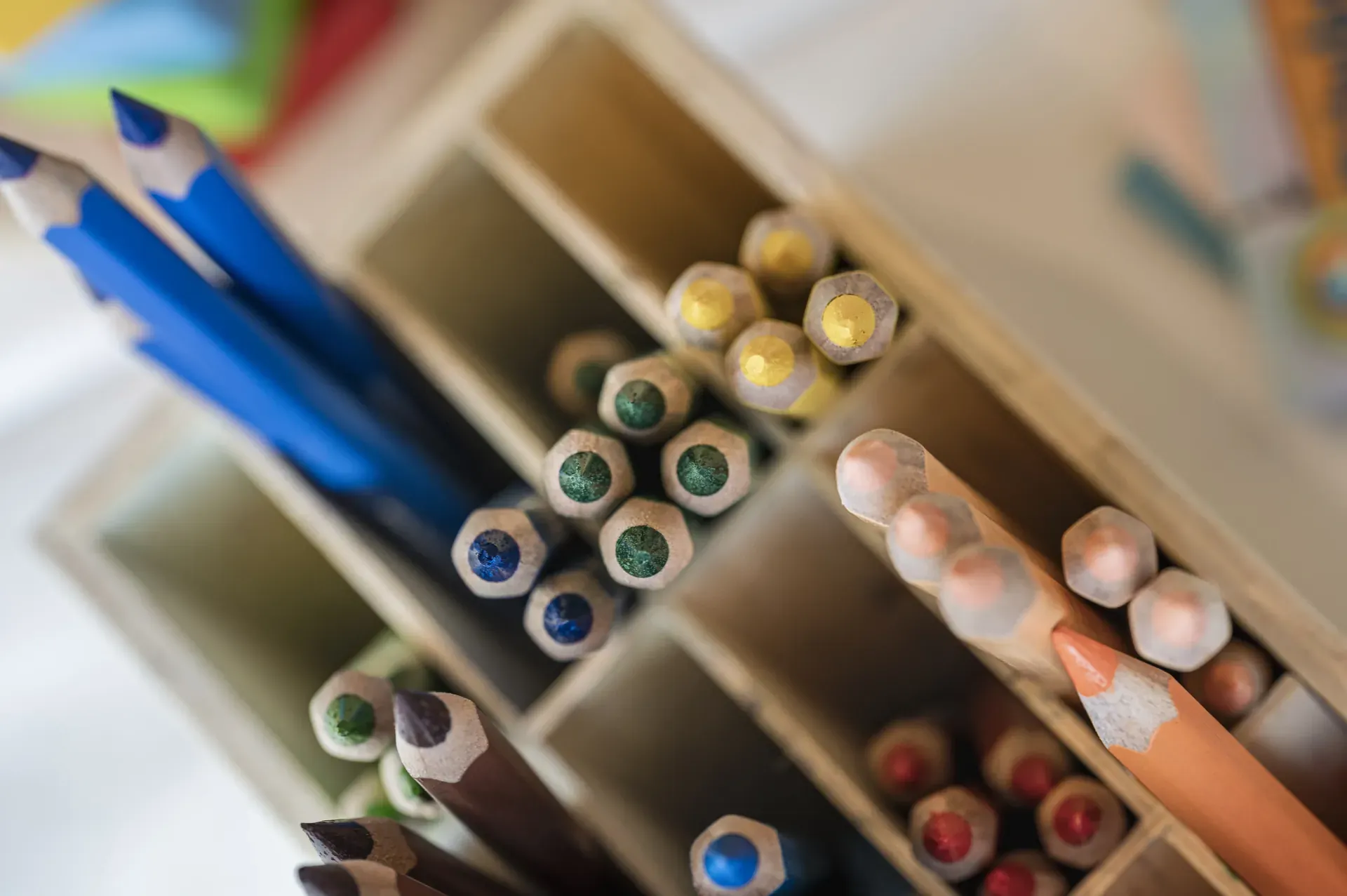 Colourful pencils in the kids' craft station at a wedding in the Greenvieh Chalet, Mieming